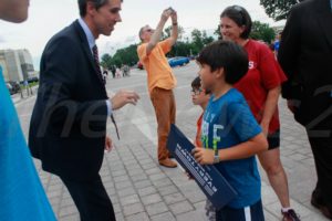Congressman Beto O`Rourke talking to a kid and his Mother..Photo Niyi Fote