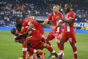 Canada`s players celebrate their 4th goal