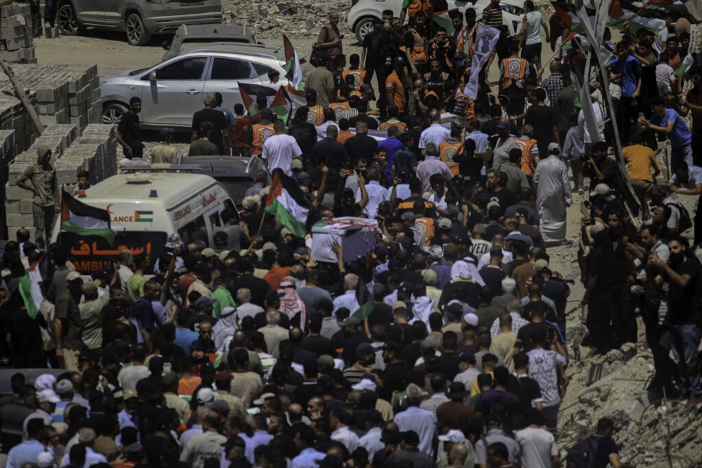 (INT) Palestinians Hold Mass Funeral for 112 Members of One Family Killed During Gaza War AUGUST 4, 2026, Gaza, Palestine: Palestinians hold a funeral