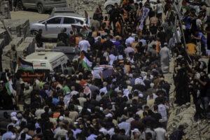 (INT) Palestinians Hold Mass Funeral for 112 Members of One Family Killed During Gaza War AUGUST 4, 2026, Gaza, Palestine: Palestinians hold a funeral