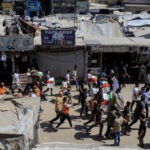 Funeral coletivo em Gaza sepulta cinquenta vítimas resgatadas dos escombros após meses de buscas